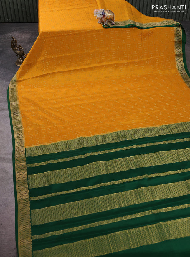 Pure mysore silk saree mustard yellow and green with allover zari woven geometric buttas and zari woven border
