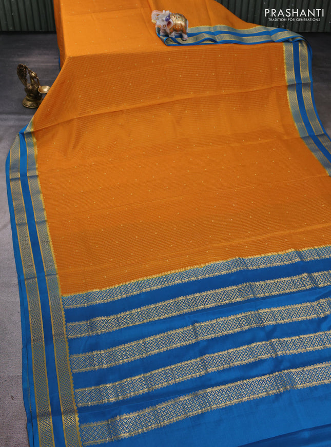 Pure mysore silk saree dark mustard and peacock blue with allover small zari checks & buttas and rettapet zari woven border