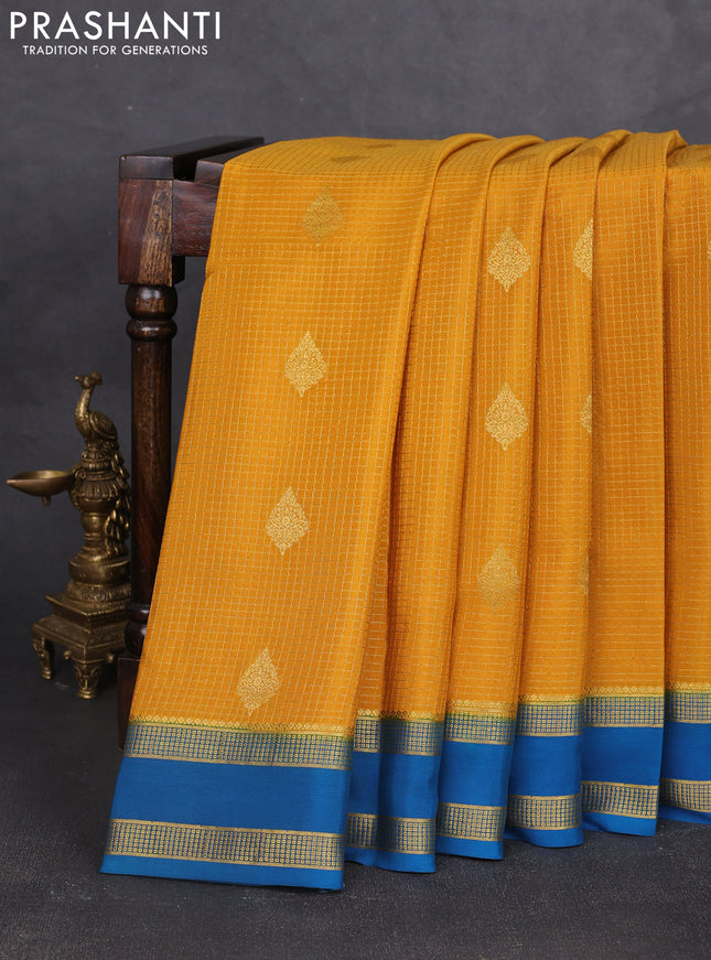 Pure mysore silk saree mustard yellow and peacock blue with allover small zari checks & buttas and rettapet zari woven border