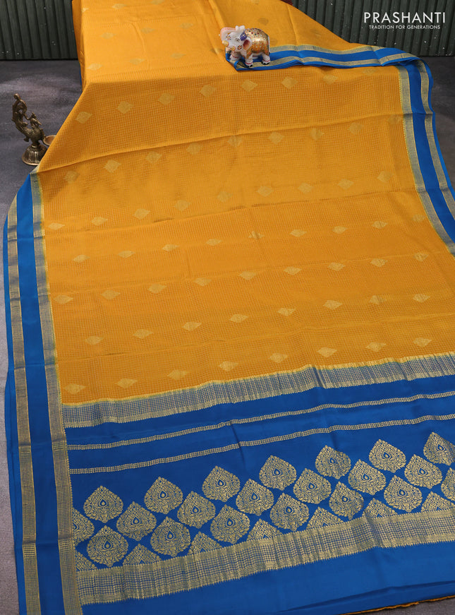 Pure mysore silk saree mustard yellow and peacock blue with allover small zari checks & buttas and rettapet zari woven border