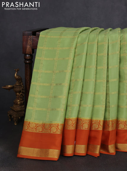 Pure mysore silk saree pista green and mustard yellow with allover zari checked pattern and rettapet zari woven border