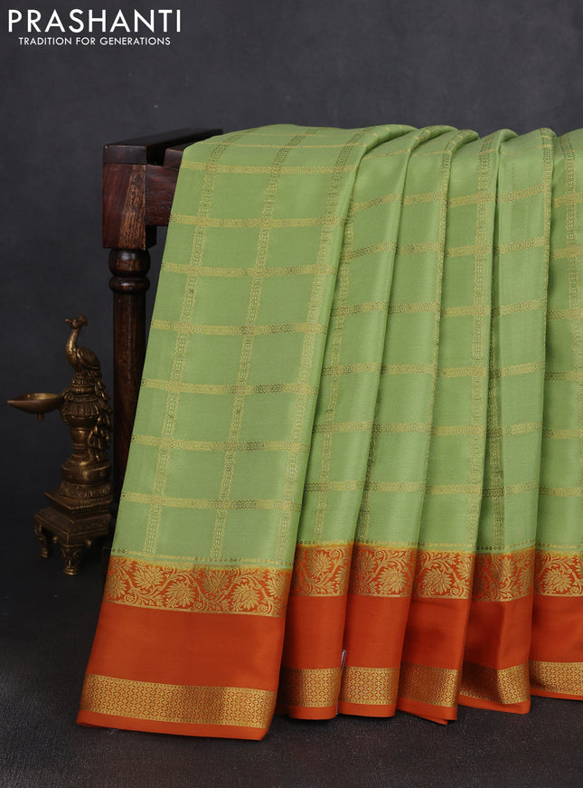 Pure mysore silk saree pista green and mustard yellow with allover zari checked pattern and rettapet zari woven border