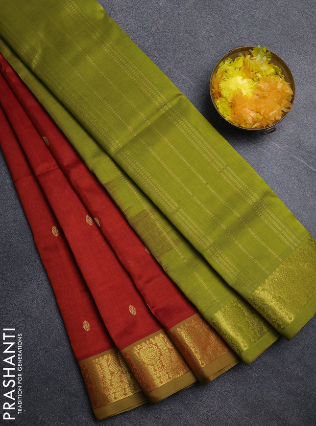 Silk cotton saree rustic orange and light green with zari woven buttas and zari woven border