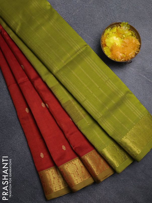 Silk cotton saree rustic orange and light green with zari woven buttas and zari woven border