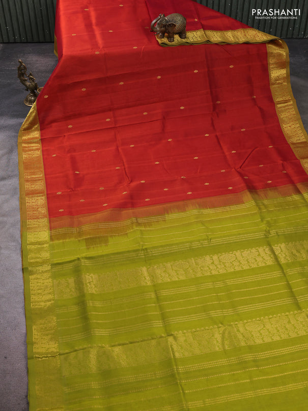 Silk cotton saree rustic orange and light green with zari woven buttas and zari woven border