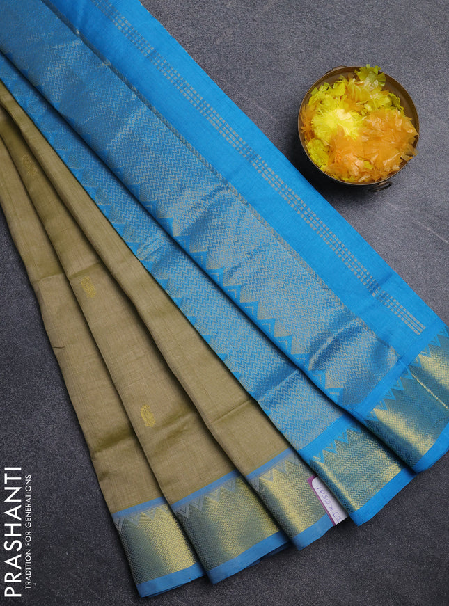 Silk cotton saree elachi green and cs blue with paisley zari woven buttas and temple design zari woven border
