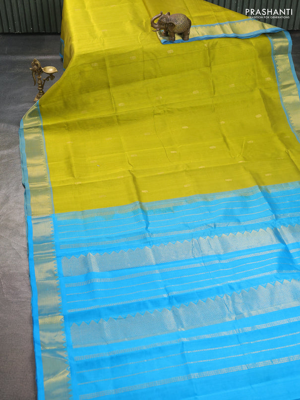 Silk cotton saree lime green and cs blue with paisley zari woven buttas and temple design zari woven border