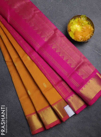 Silk cotton saree mango yellow and pink with paisley zari woven buttas and temple design zari woven border