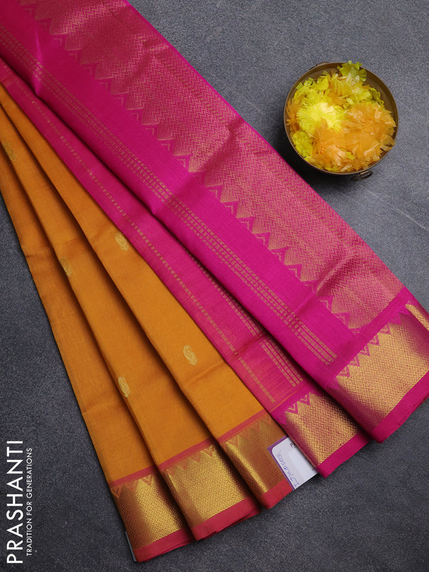 Silk cotton saree mango yellow and pink with paisley zari woven buttas and temple design zari woven border