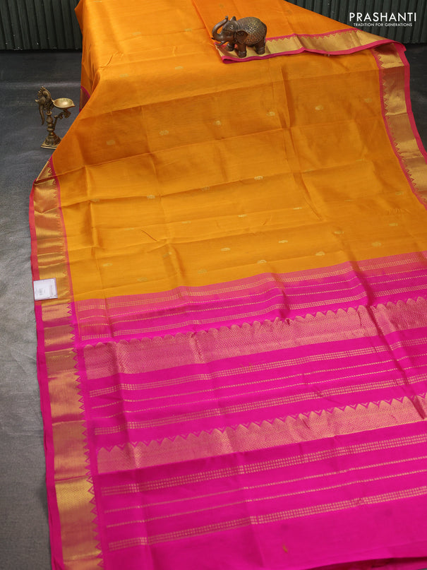 Silk cotton saree mango yellow and pink with paisley zari woven buttas and temple design zari woven border