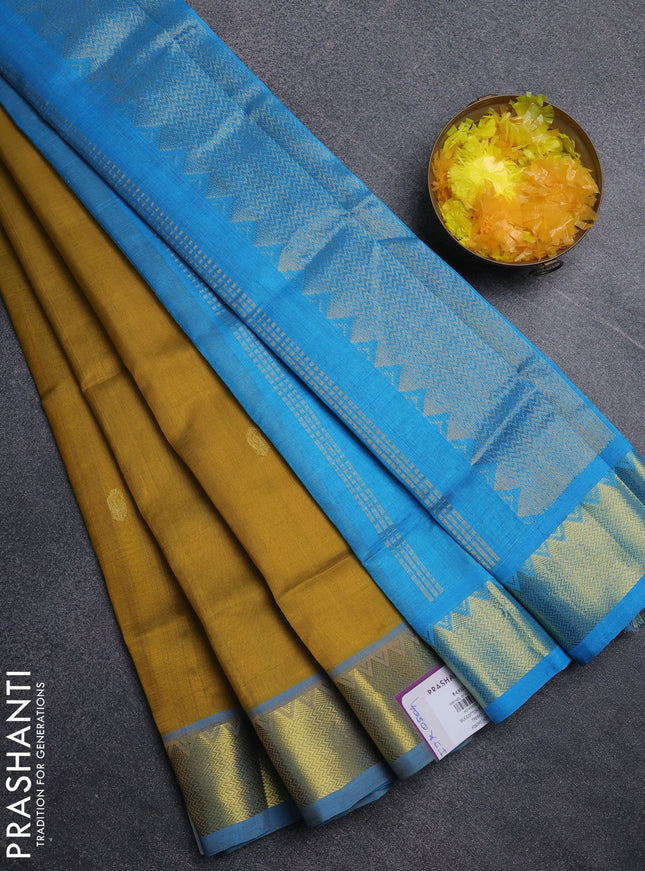 Silk cotton saree mustard yellow and cs blue with paisley zari woven buttas and temple design zari woven border