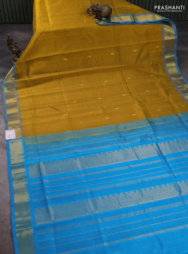 Silk cotton saree mustard yellow and cs blue with paisley zari woven buttas and temple design zari woven border
