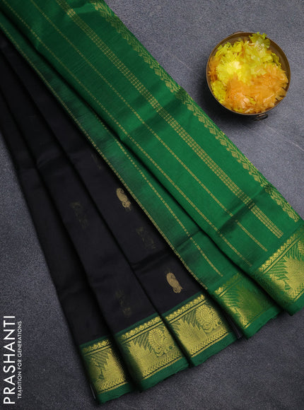 Silk cotton saree black and green with paisley zari woven buttas and temple & annam zari woven border