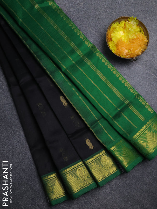 Silk cotton saree black and green with paisley zari woven buttas and temple & annam zari woven border