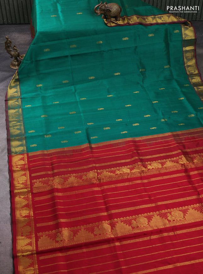 Silk cotton saree green shade and maroon with paisley zari woven buttas and temple & annam zari woven border