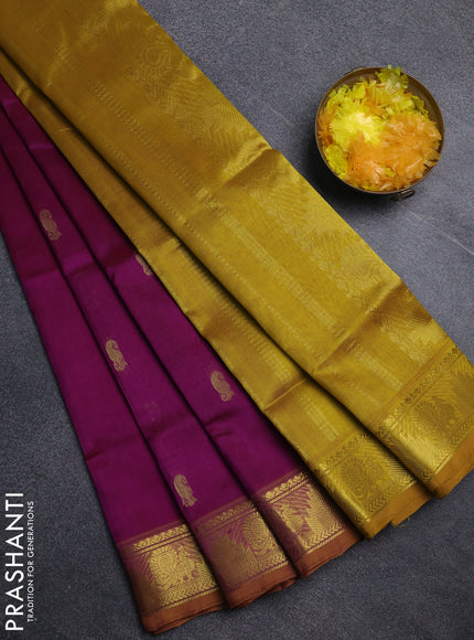 Silk cotton saree purple and mustard yellow with paisley zari woven buttas and temple & annam zari woven border