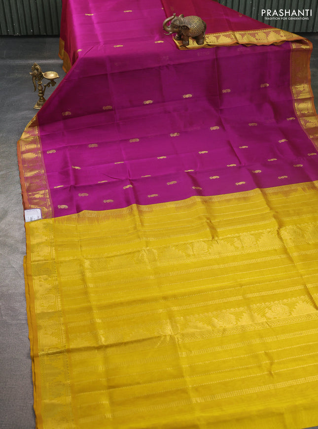 Silk cotton saree purple and mustard yellow with paisley zari woven buttas and temple & annam zari woven border