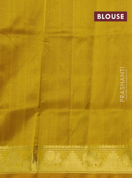 Silk cotton saree purple and mustard yellow with paisley zari woven buttas and temple & annam zari woven border