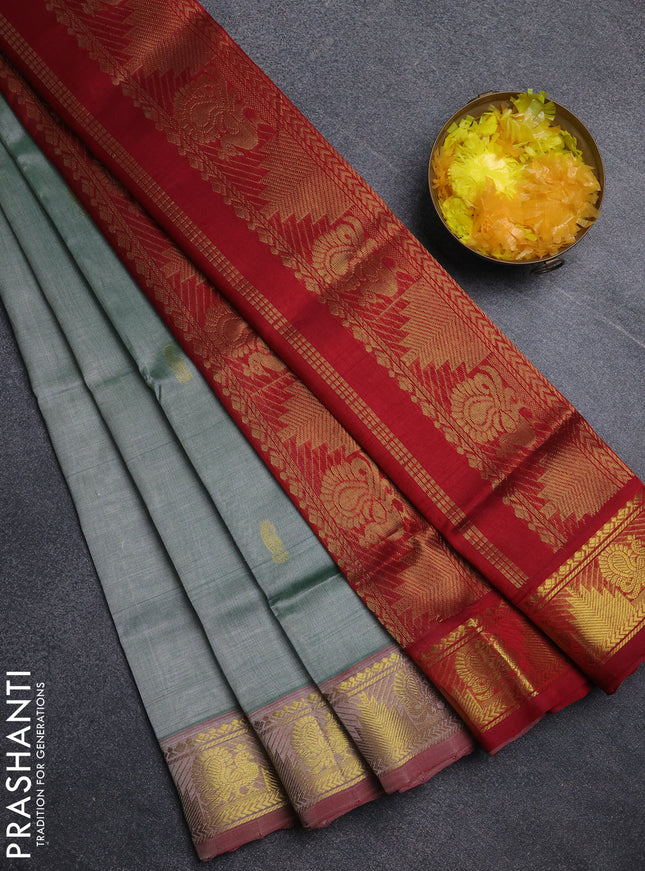 Silk cotton saree green shade and maroon with paisley zari woven buttas and temple & annam zari woven border