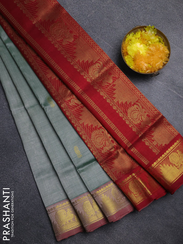 Silk cotton saree green shade and maroon with paisley zari woven buttas and temple & annam zari woven border