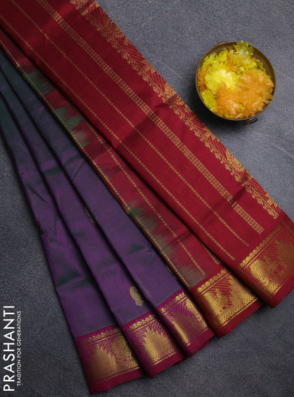 Silk cotton saree dual shade of greenish purple and wine shade with paisley zari woven buttas and temple & annam zari woven border
