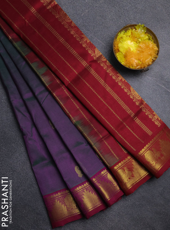 Silk cotton saree dual shade of greenish purple and wine shade with paisley zari woven buttas and temple & annam zari woven border
