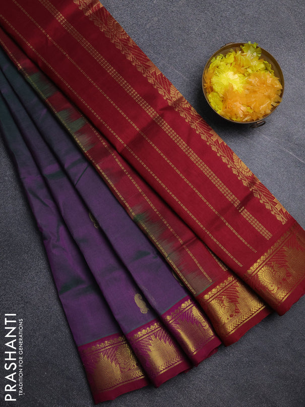 Silk cotton saree dual shade of greenish purple and wine shade with paisley zari woven buttas and temple & annam zari woven border