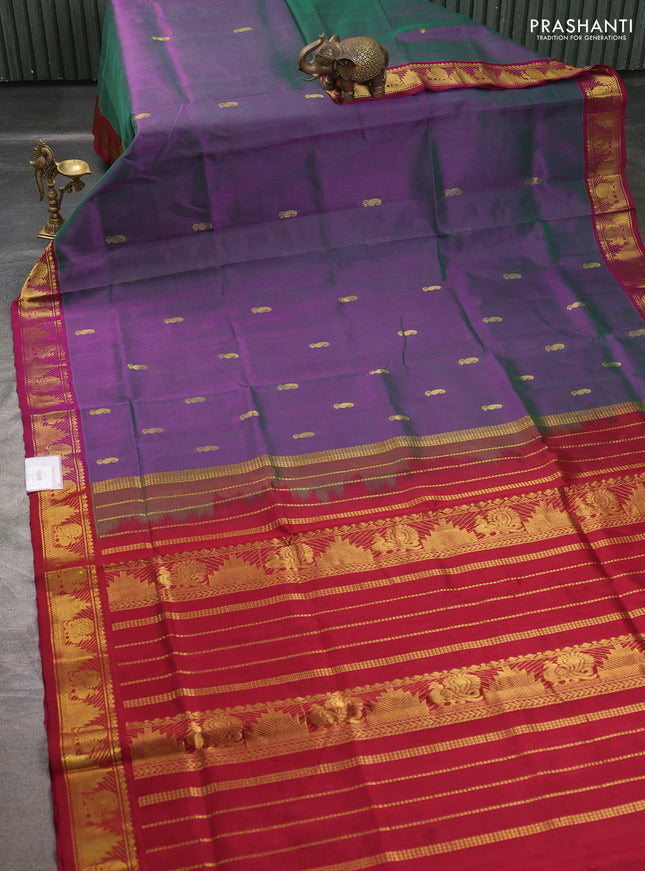Silk cotton saree dual shade of greenish purple and wine shade with paisley zari woven buttas and temple & annam zari woven border
