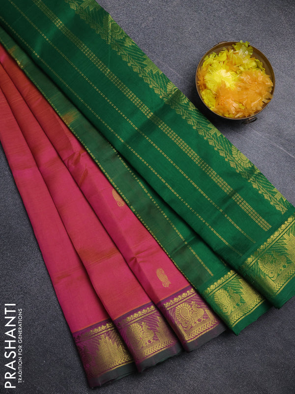 Silk cotton saree dual shade of pinkish orange and green with paisley zari woven buttas and temple & annam zari woven border