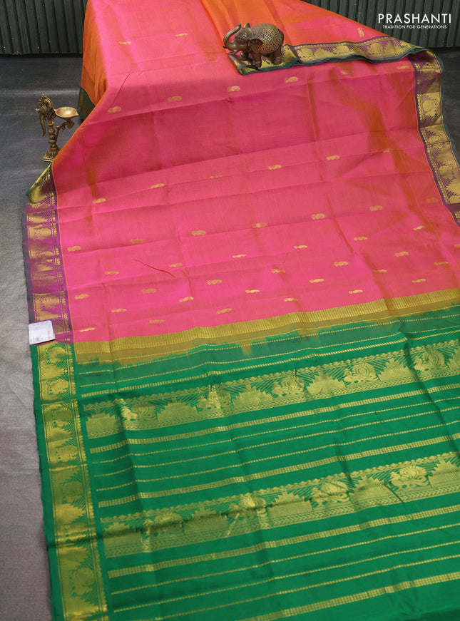 Silk cotton saree dual shade of pinkish orange and green with paisley zari woven buttas and temple & annam zari woven border