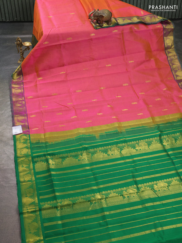 Silk cotton saree dual shade of pinkish orange and green with paisley zari woven buttas and temple & annam zari woven border