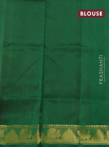 Silk cotton saree dual shade of pinkish orange and green with paisley zari woven buttas and temple & annam zari woven border