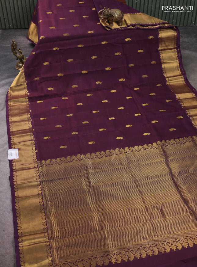 Silk cotton saree wine shade with paisley zari woven buttas and zari woven border