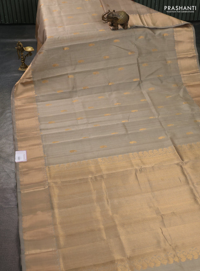 Silk cotton saree beige with paisley zari woven buttas and zari woven border