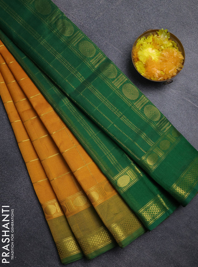 Silk cotton saree yellow and green with allover zari checked pattern and rettapet zari woven border