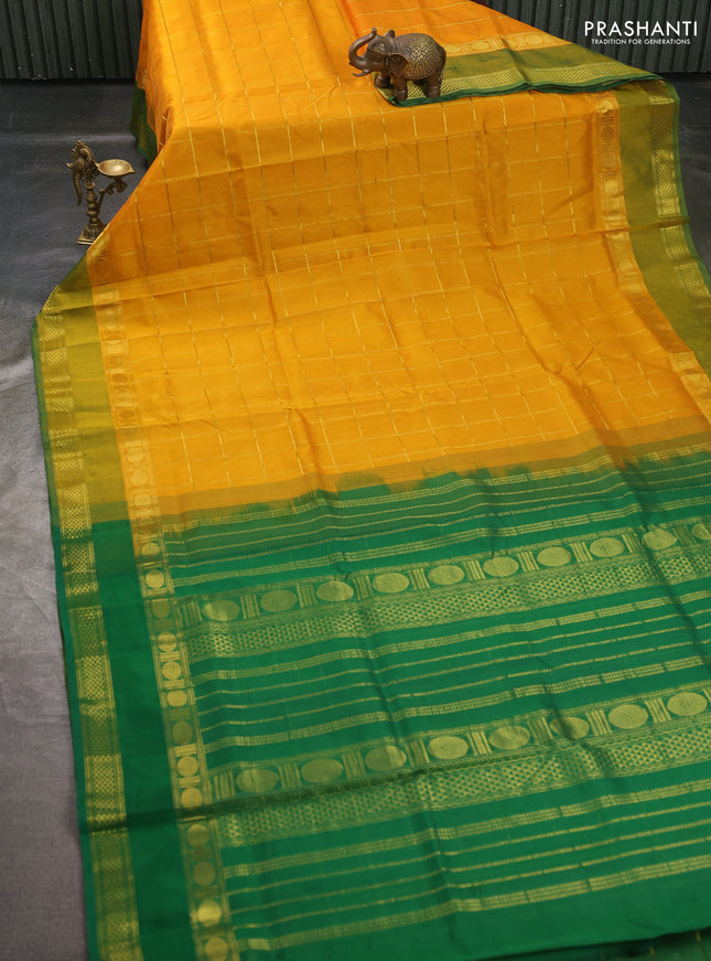 Silk cotton saree yellow and green with allover zari checked pattern and rettapet zari woven border