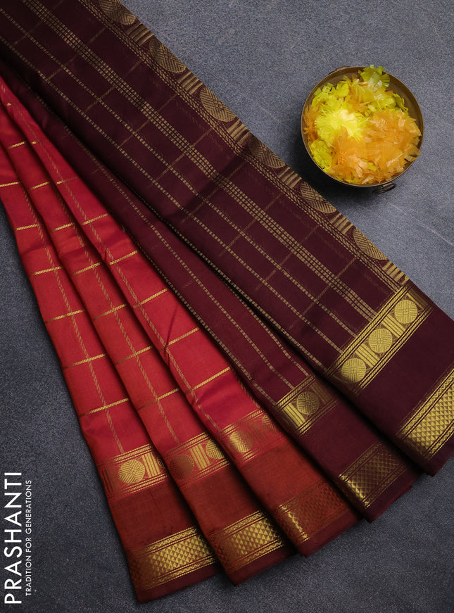 Silk cotton saree dual shade of pinkish orange and maroon with allover zari checked pattern and rettapet zari woven border