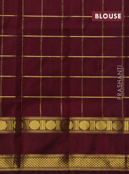 Silk cotton saree dual shade of pinkish orange and maroon with allover zari checked pattern and rettapet zari woven border