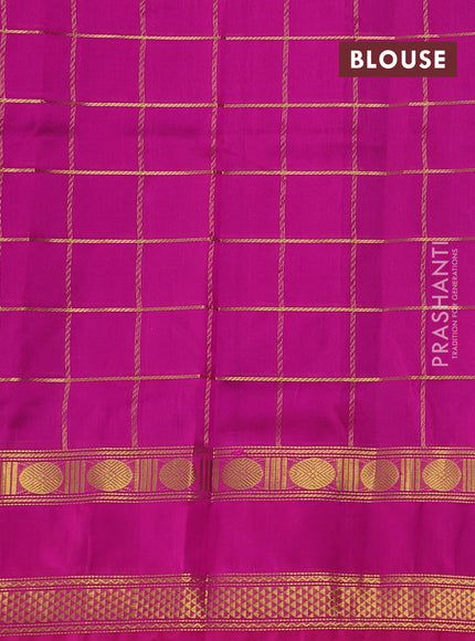 Silk cotton saree royal blue and pink with allover zari checked pattern and rettapet zari woven border