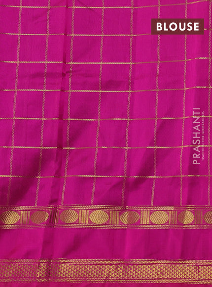 Silk cotton saree deep violet and pink with allover zari checked pattern and rettapet zari woven border