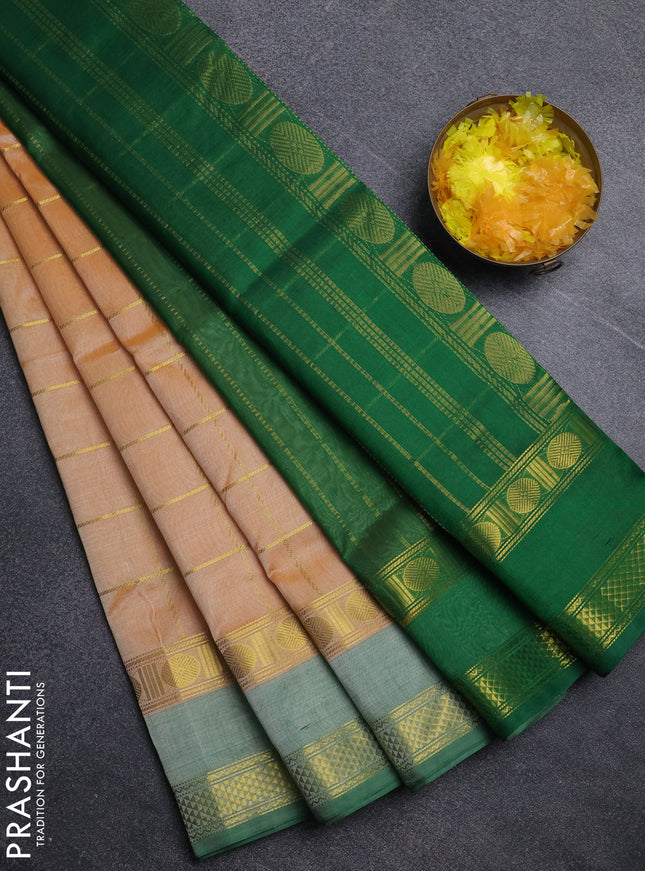 Silk cotton saree pale orange and green with allover zari checked pattern and rettapet zari woven border