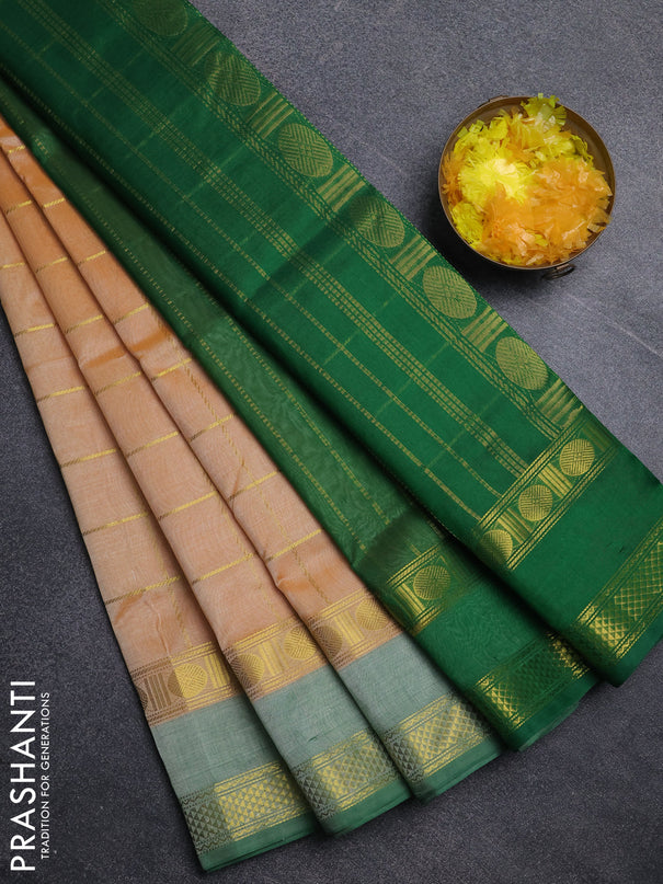 Silk cotton saree pale orange and green with allover zari checked pattern and rettapet zari woven border