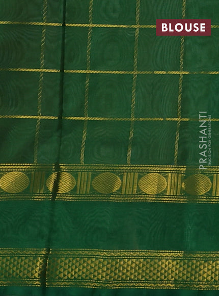 Silk cotton saree pale orange and green with allover zari checked pattern and rettapet zari woven border