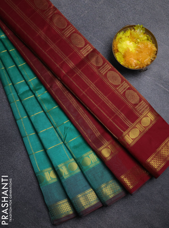 Silk cotton saree teal green and maroon with allover zari checked pattern and rettapet zari woven border