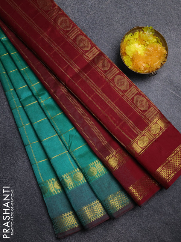 Silk cotton saree teal green and maroon with allover zari checked pattern and rettapet zari woven border