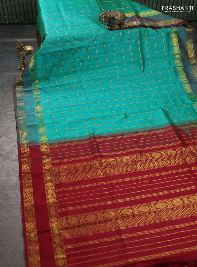 Silk cotton saree teal green and maroon with allover zari checked pattern and rettapet zari woven border