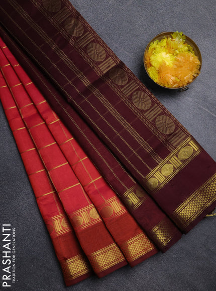 Silk cotton saree pinkish orange and wine shade with allover zari checked pattern and rettapet zari woven border