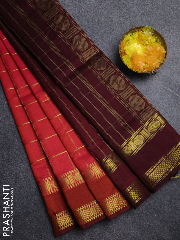 Silk cotton saree pinkish orange and wine shade with allover zari checked pattern and rettapet zari woven border