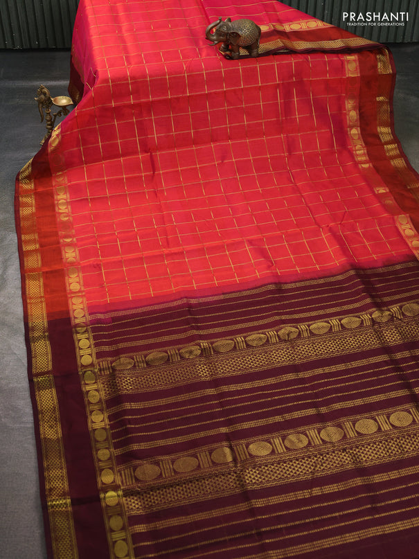 Silk cotton saree pinkish orange and wine shade with allover zari checked pattern and rettapet zari woven border