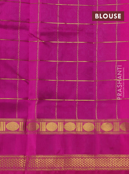 Silk cotton saree peacock green and pink with allover zari checked pattern and rettapet zari woven border